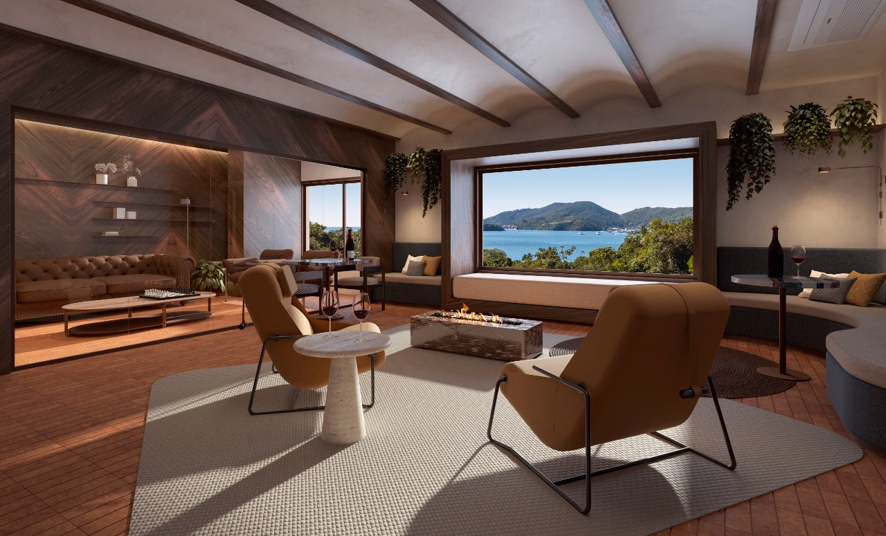 Lounge com lareira e janela panorâmica para o mar