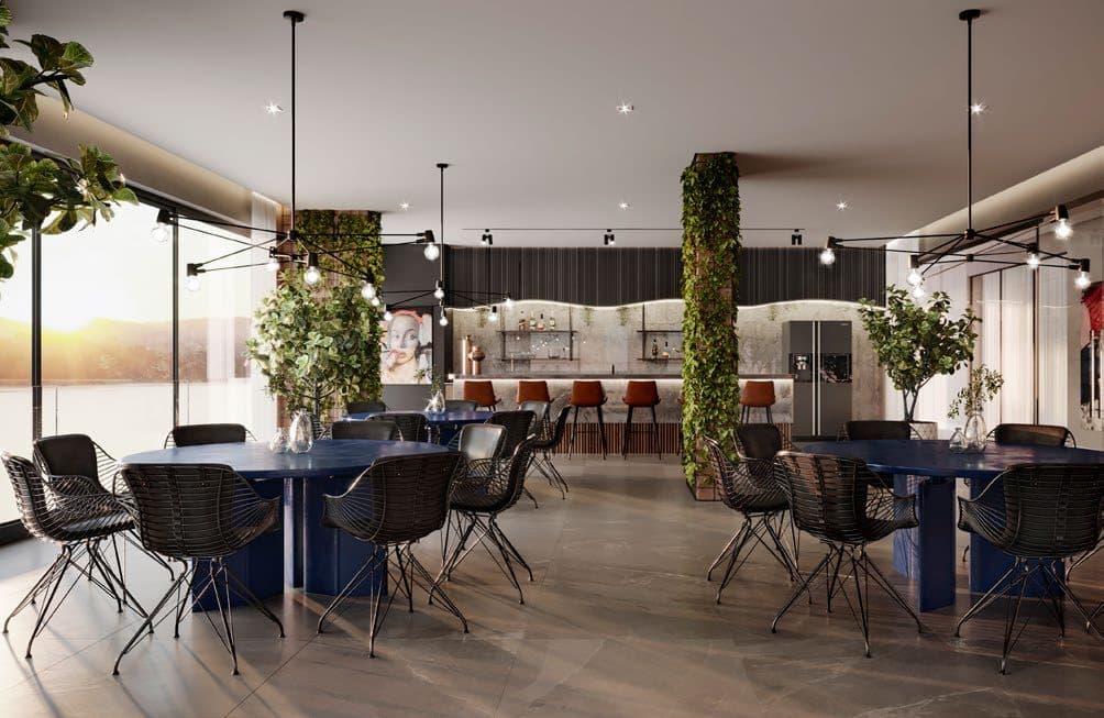 Espaço gourmet integrado ao gramado do Amrita Apartments, no Balneário Perequê