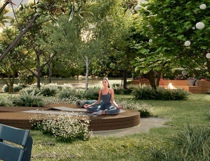 Jardim com espécies nativas e praça de fogo do Amrita Apartments, em Porto Belo