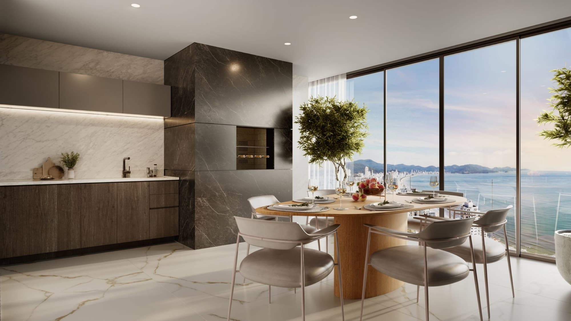 Sala de jantar e cozinha integrada de apartamento do Blend com vista panorâmica para o mar de Itapema
