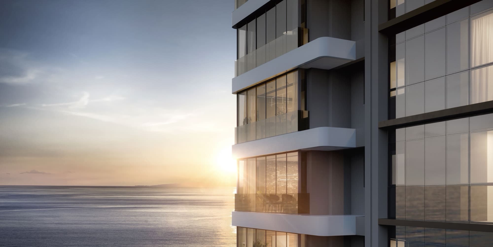 Varandas do Blend Apartments com o mar de Itapema ao pôr do sol