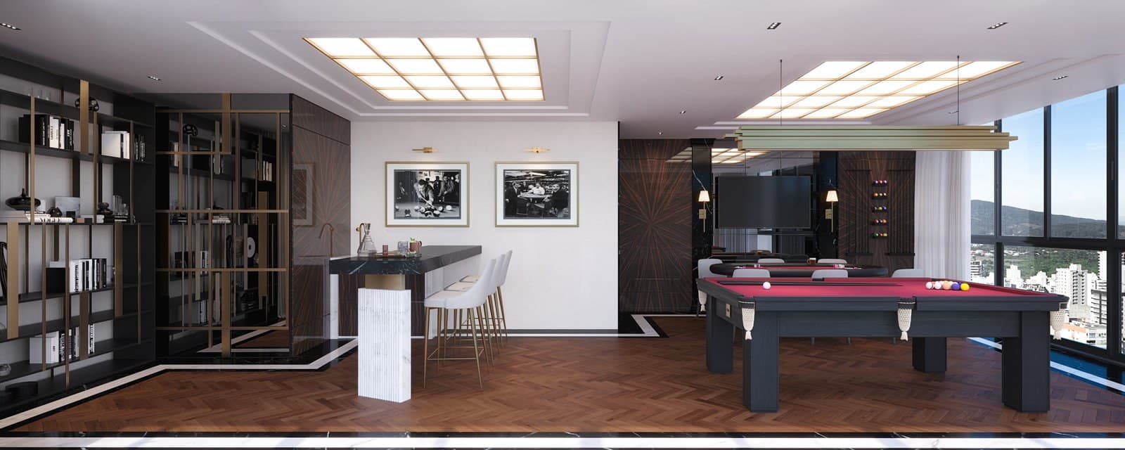 Sala de jogos com bilhar e biblioteca do Bristol Residence, em Meia Praia