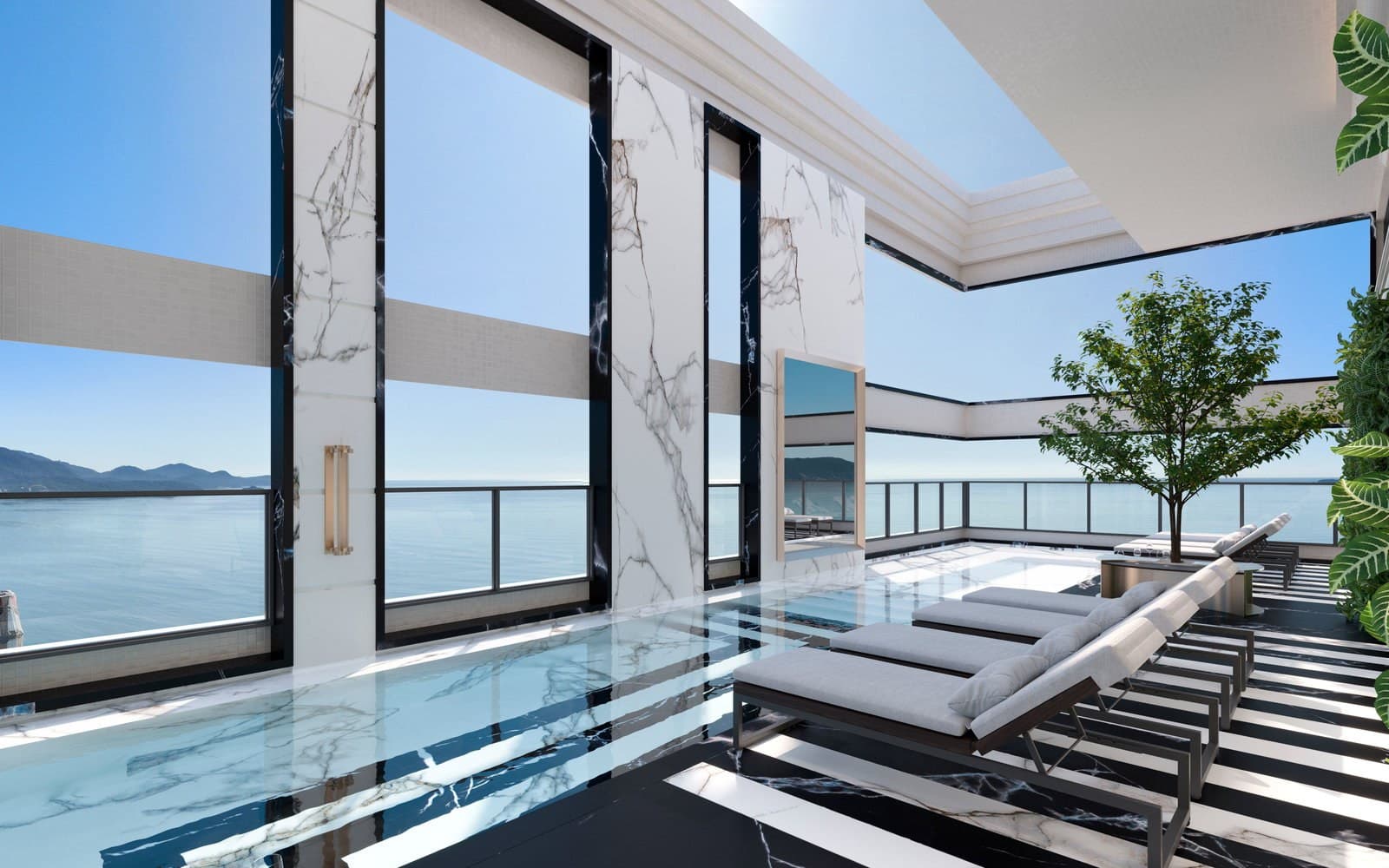 Piscina externa com vista para o mar do Bristol Residence, em Meia Praia