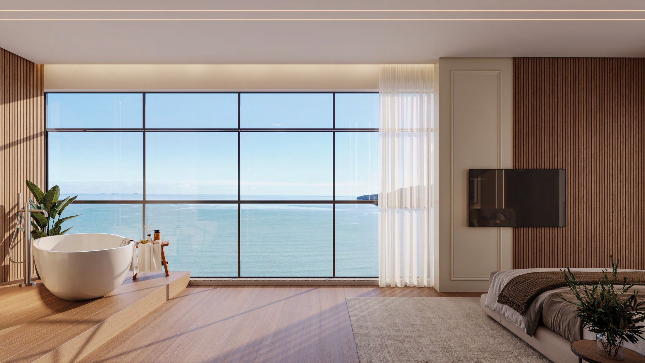 Suíte com vista para o mar de um apartamento do Burj Exclusive Residence, em Porto Belo