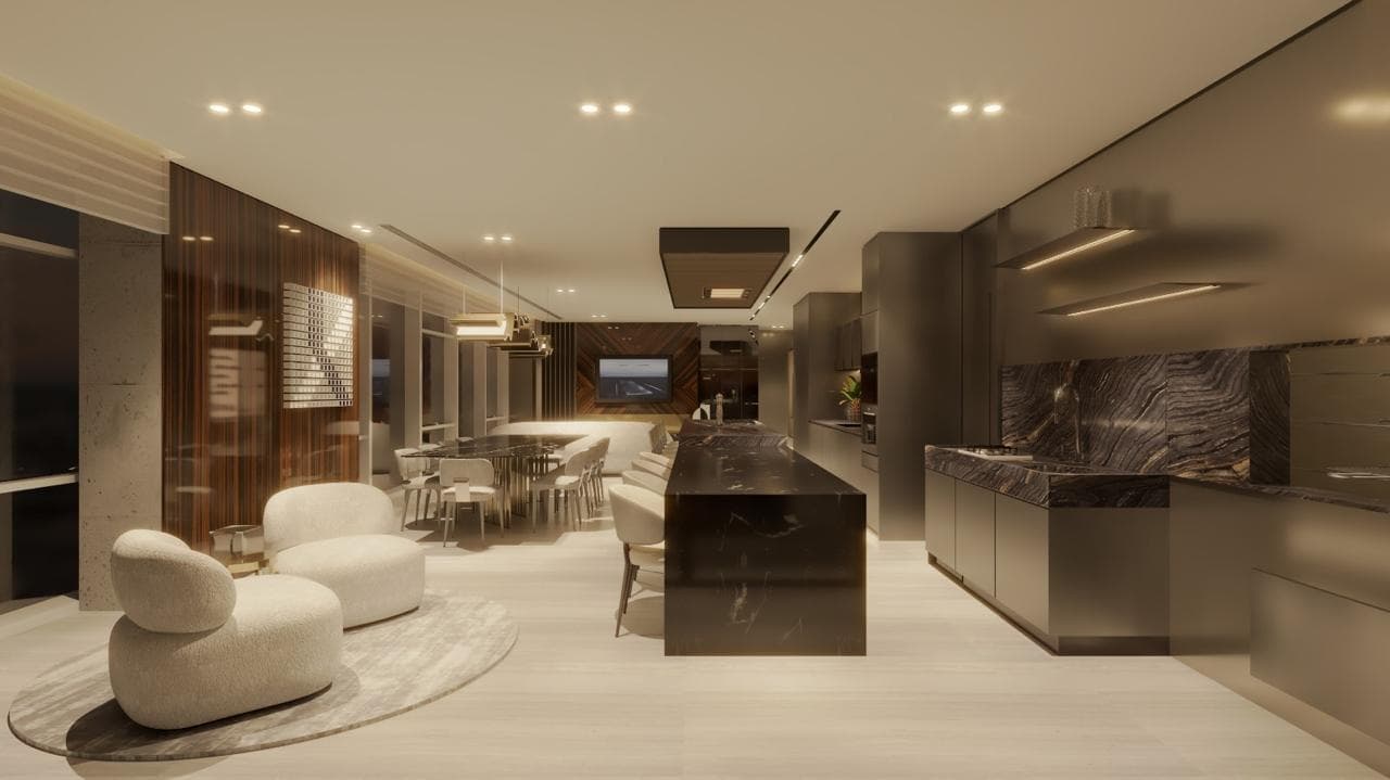 Cozinha gourmet integrada ao living do Evolution Residence com ilha em mármore e duas entradas independentes