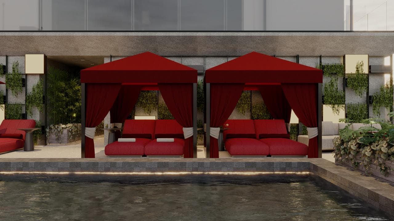 Cabanas privativas à beira da piscina do Evolution Residence com jardim vertical