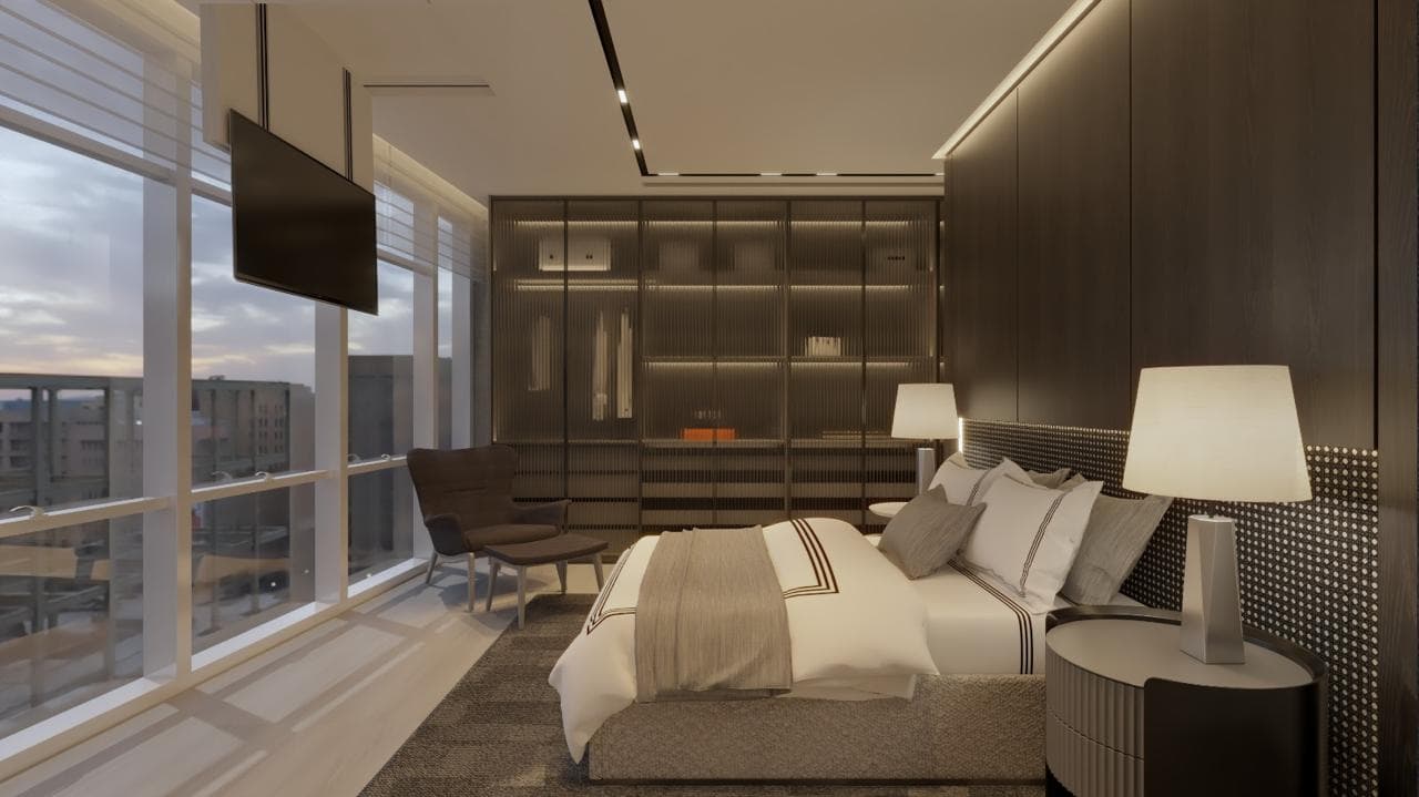 Suíte do Evolution Residence com vista para o mar — um único apartamento por andar garante privacidade total
