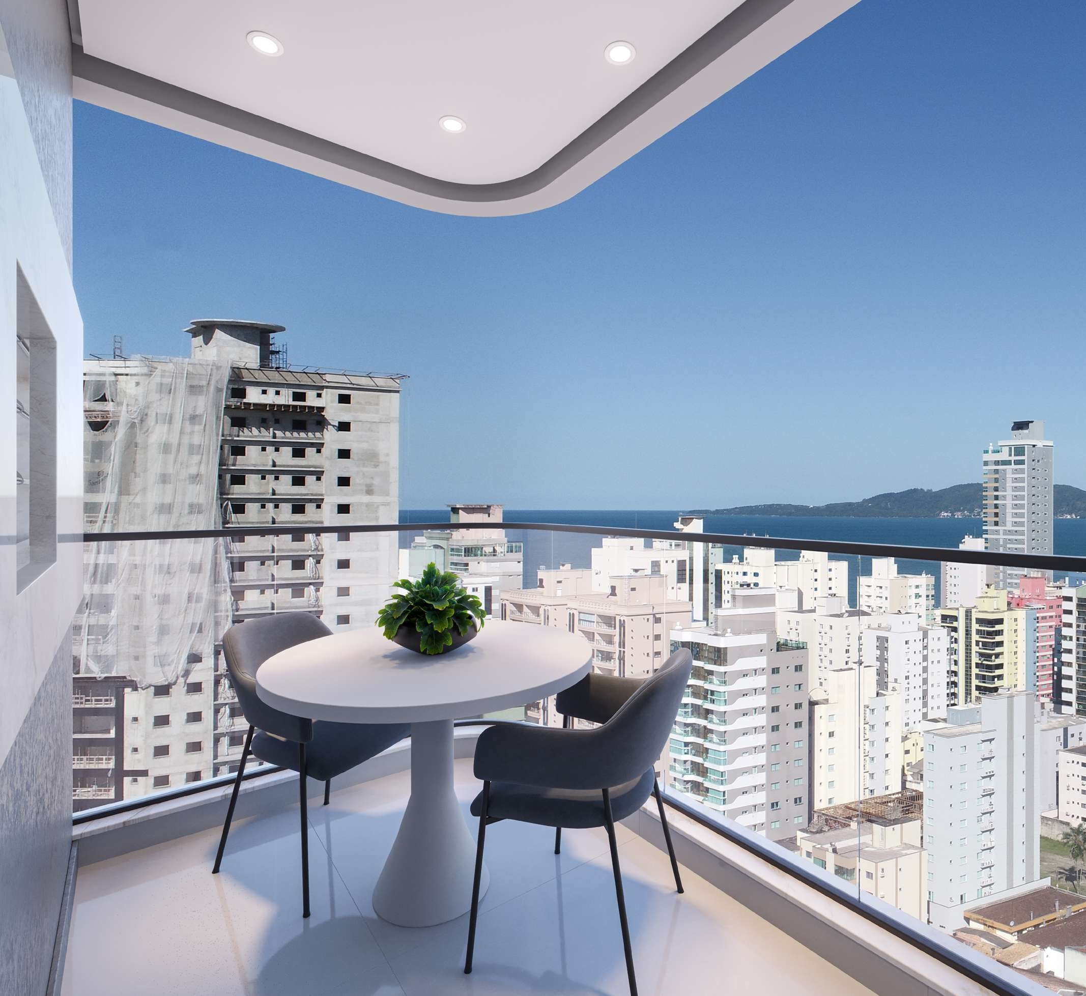 Sacada com churrasqueira de apartamento do Gran Lunare, com vista da cidade de Itapema