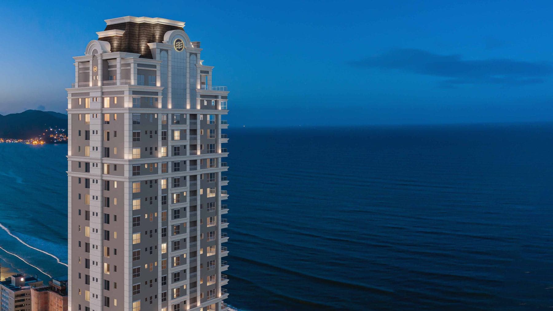 Torre de 61 pavimentos do L'Atelier Concept Home ao anoitecer, na Meia Praia, Itapema