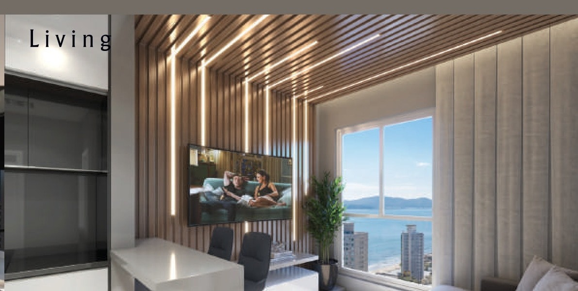 Living de um flat do Le Rêve com vista para o mar de Meia Praia, Itapema