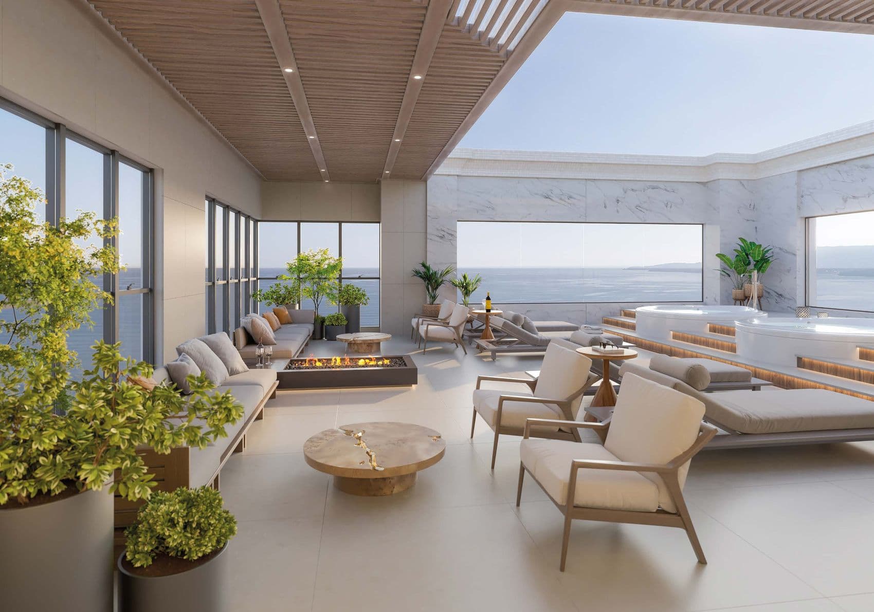 Lounge com fire place no rooftop do Palazzo Royale, com vista para o mar de Itapema