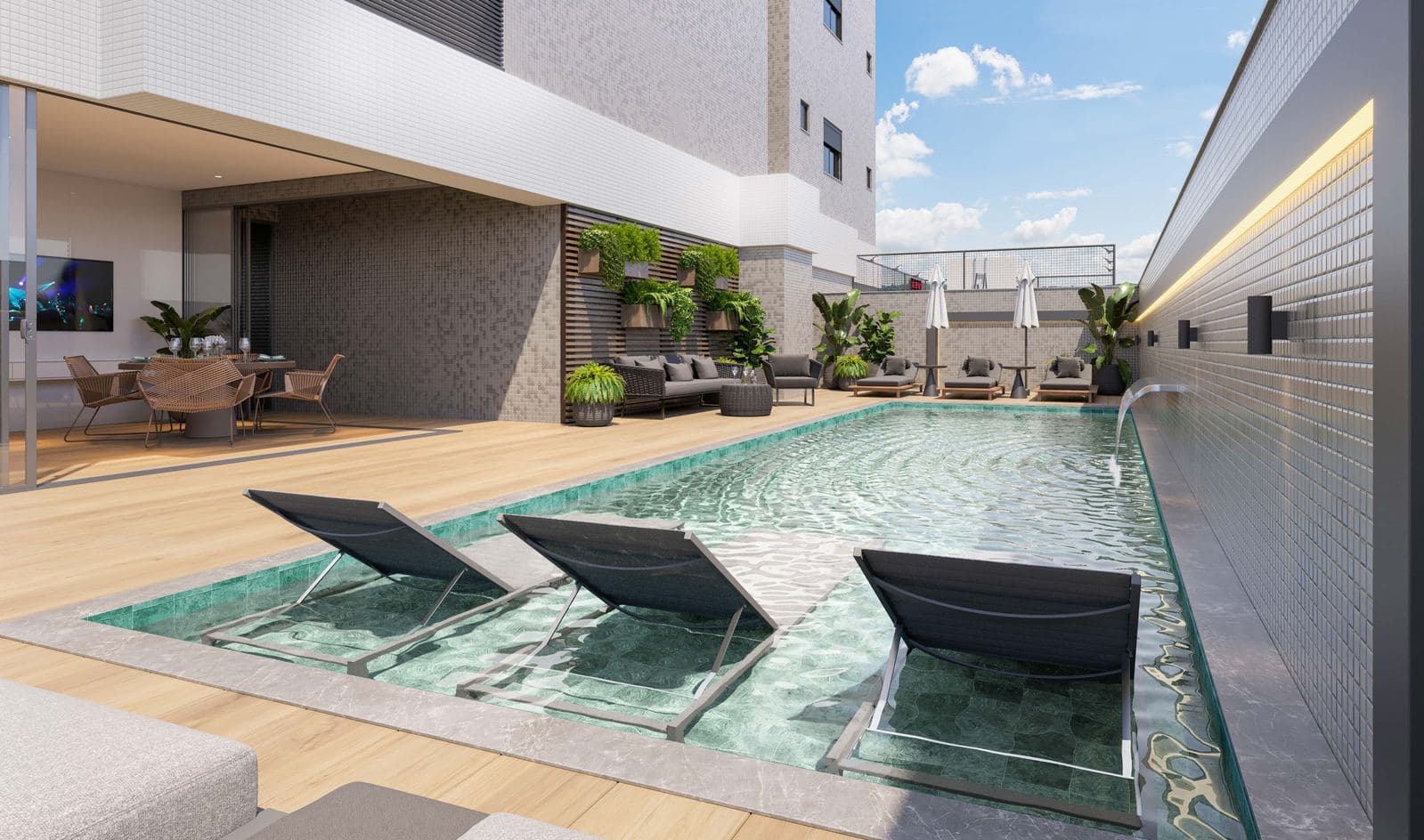 Piscina externa aquecida com prainha e terraço do Santiago Residencial, em Itapema