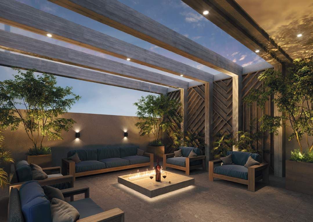 Lounge com fire place do Serenity Residence, em Itapema