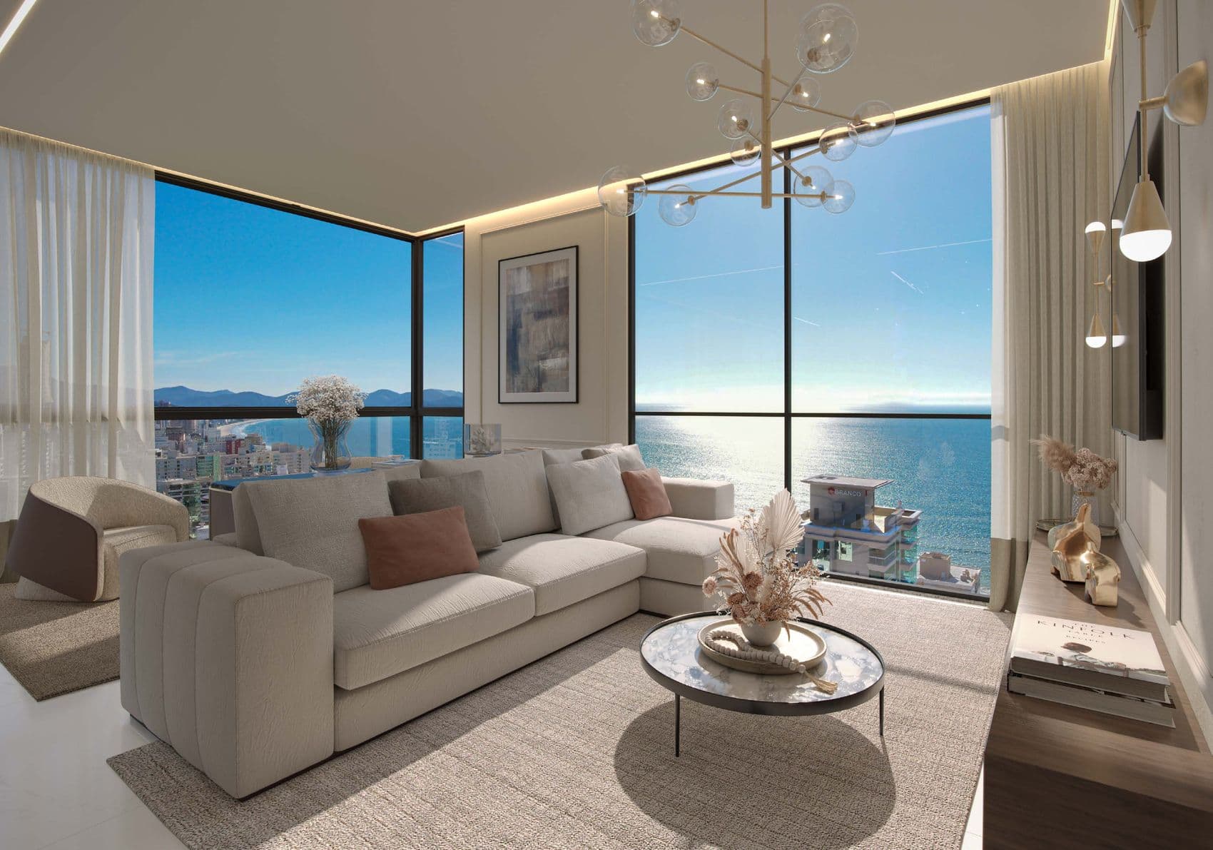 Living do apartamento tipo do The Breeze, com vista para o mar da Meia Praia, Itapema