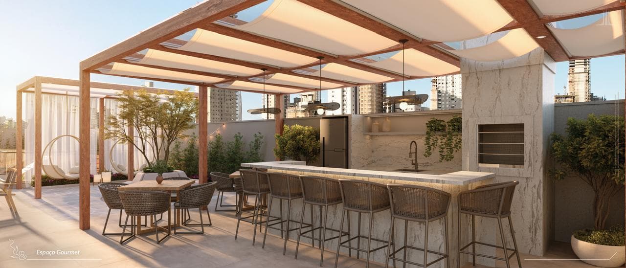 Espaço gourmet do Torres de Marseille, com bancada e churrasqueira