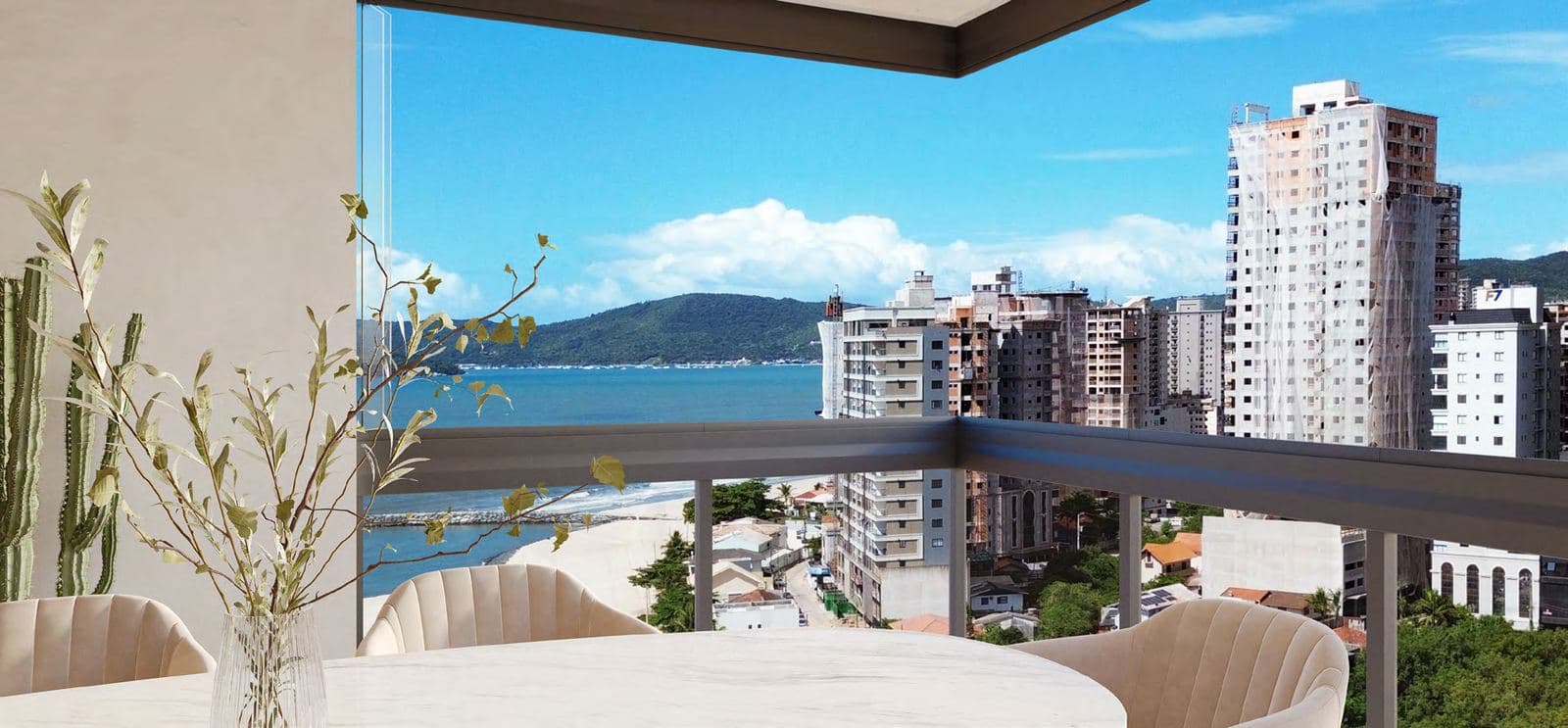 Sala de jantar e cozinha integradas de um apartamento do Tower23, em Meia Praia, Itapema
